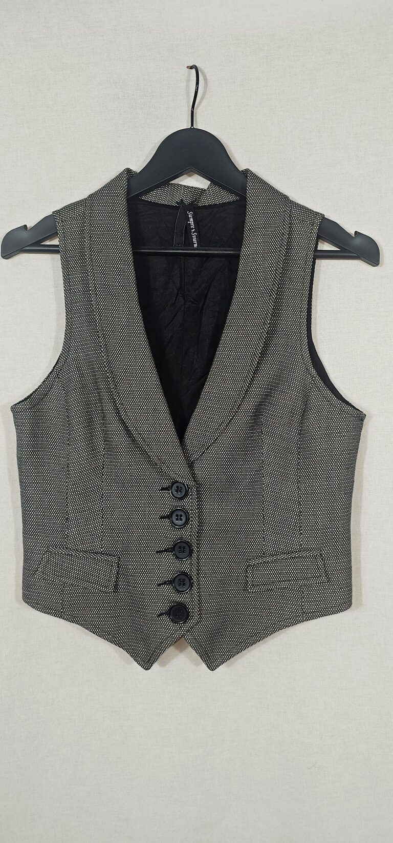 chaleco estampado tweed blanco y negro
