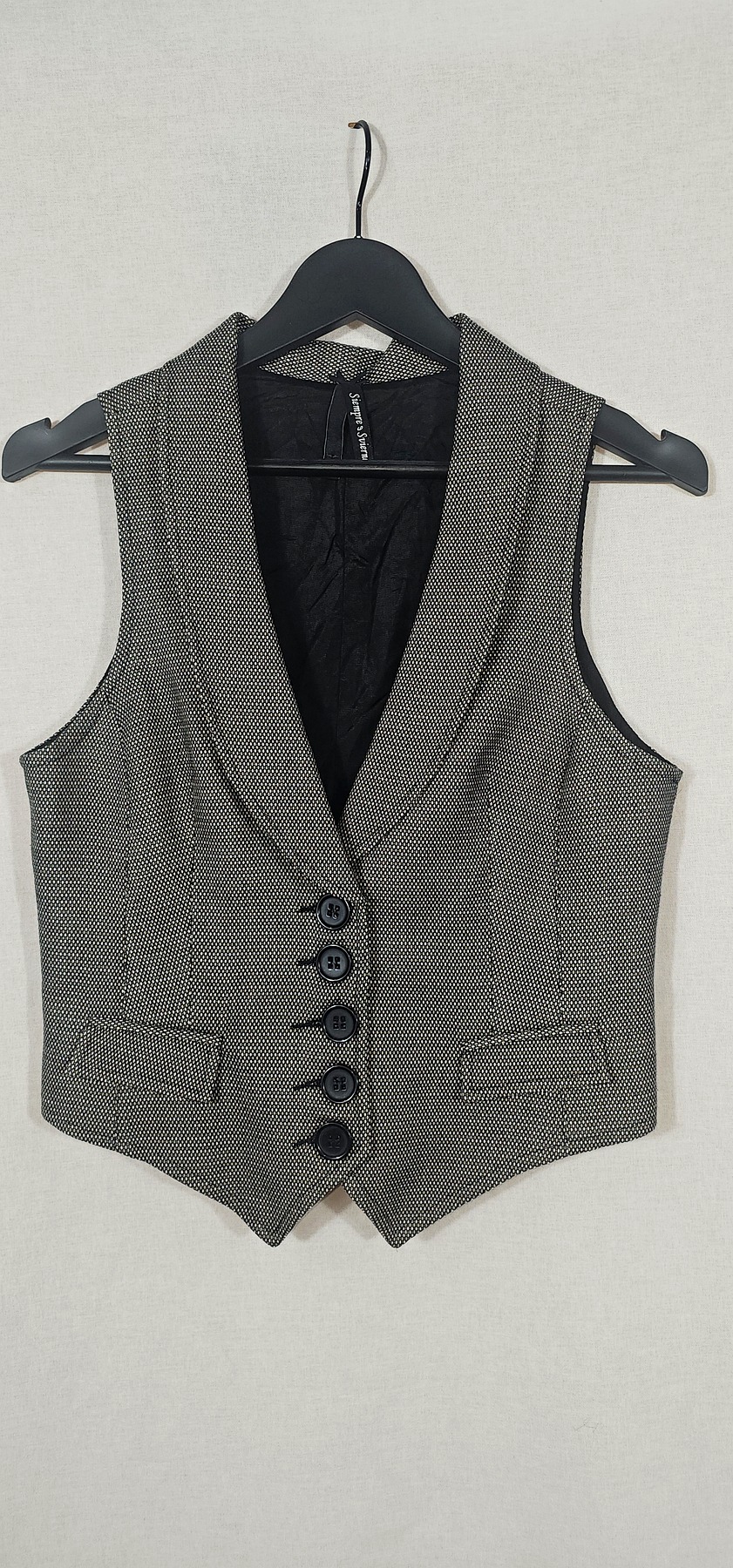 chaleco estampado tweed blanco y negro