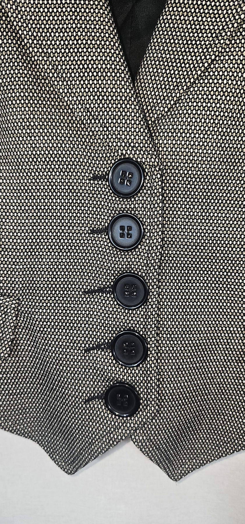 chaleco estampado tweed blanco y negro